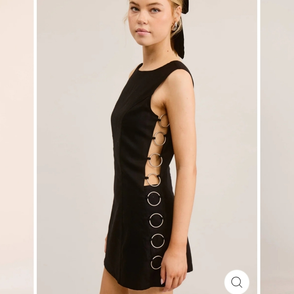 Elegant Black Dress with Side Ring Detailing